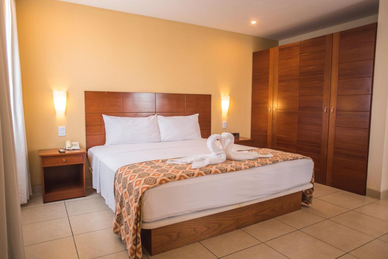 Wyndham Costa Del Sol Pucallpa Exterior photo A bedroom at the hotel